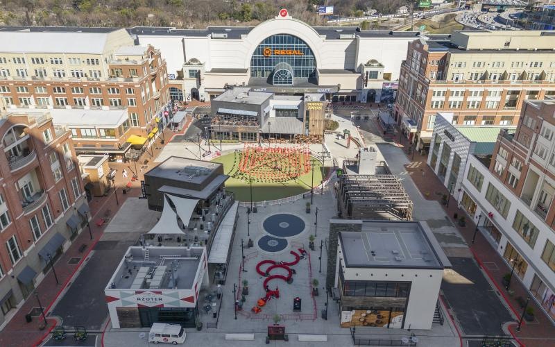 a large courtyard with buildings around it